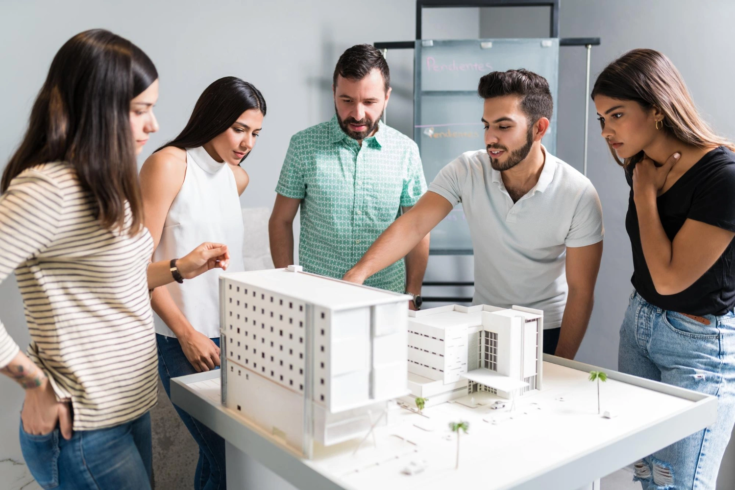 Real estate agent reviewing property listings managed by The Market Winners virtual assistant team